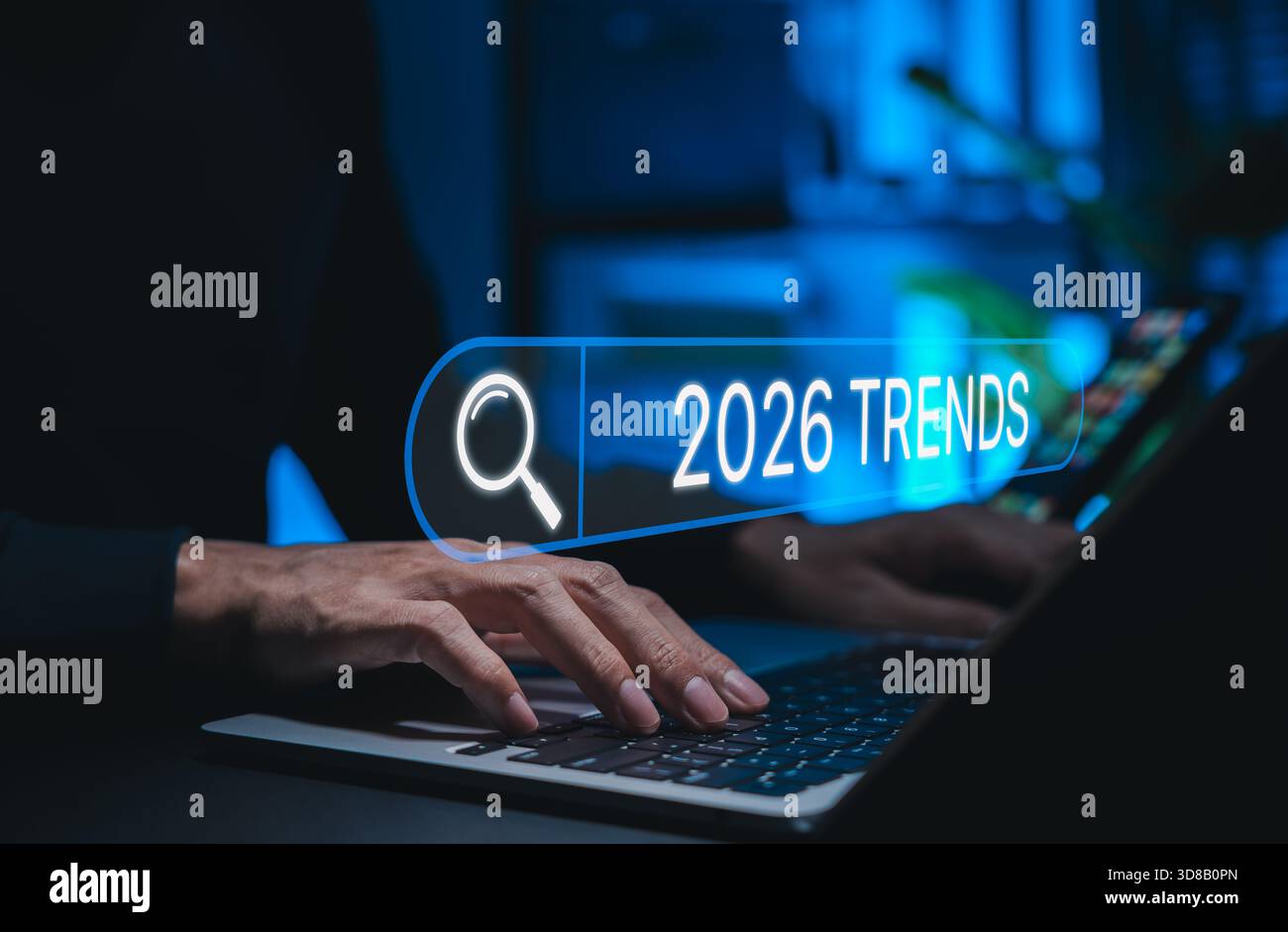 Trend 2026 anni. Uomo d'affari che utilizza la barra di ricerca con il testo 2026 Trends. Ideale per la tecnologia del futuro, l'innovazione digitale, il marketing SEO, il mercato Foto Stock