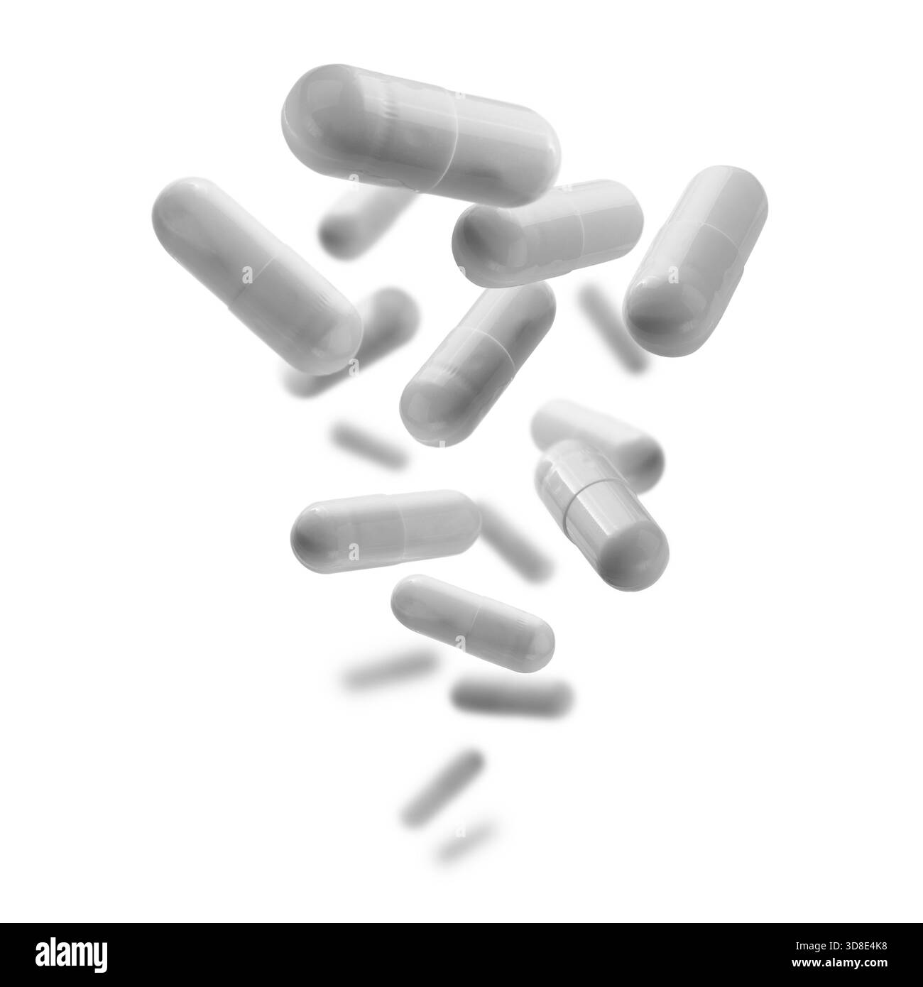 Capsule con il farmaco levitate su sfondo bianco. Foto Stock