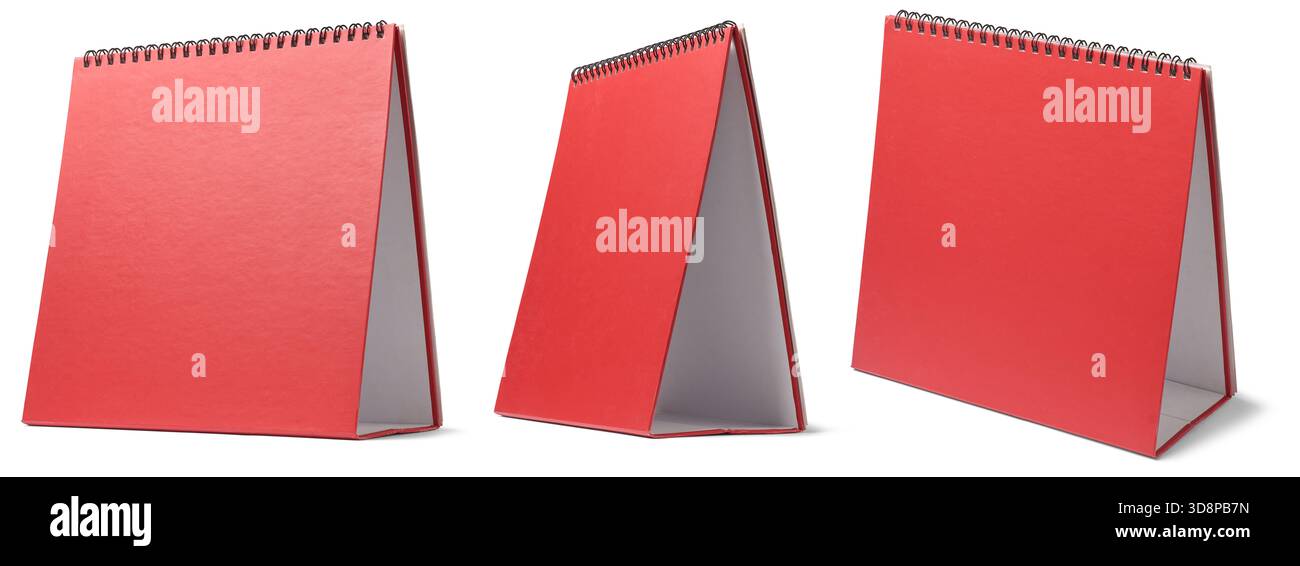 calendario da scrivania rosso con rilegatura a spirale, blocco note testurizzato in stile tenda sfondo bianco isolato, modello mockup per il nuovo anno o per il giorno delle vacanze Foto Stock