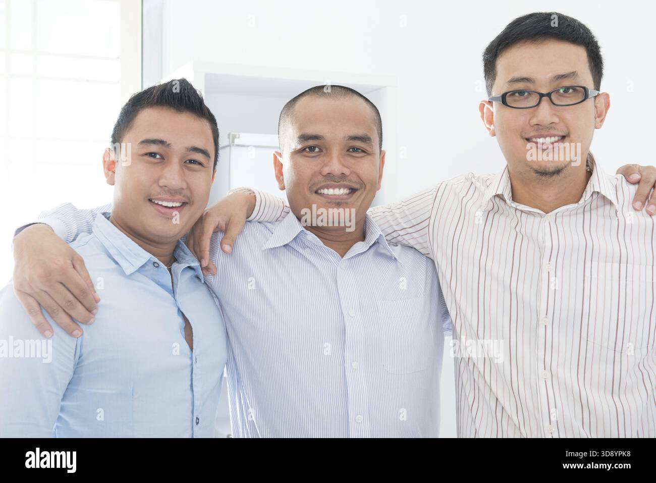 Team di business del sud-est asiatico in carica Foto Stock