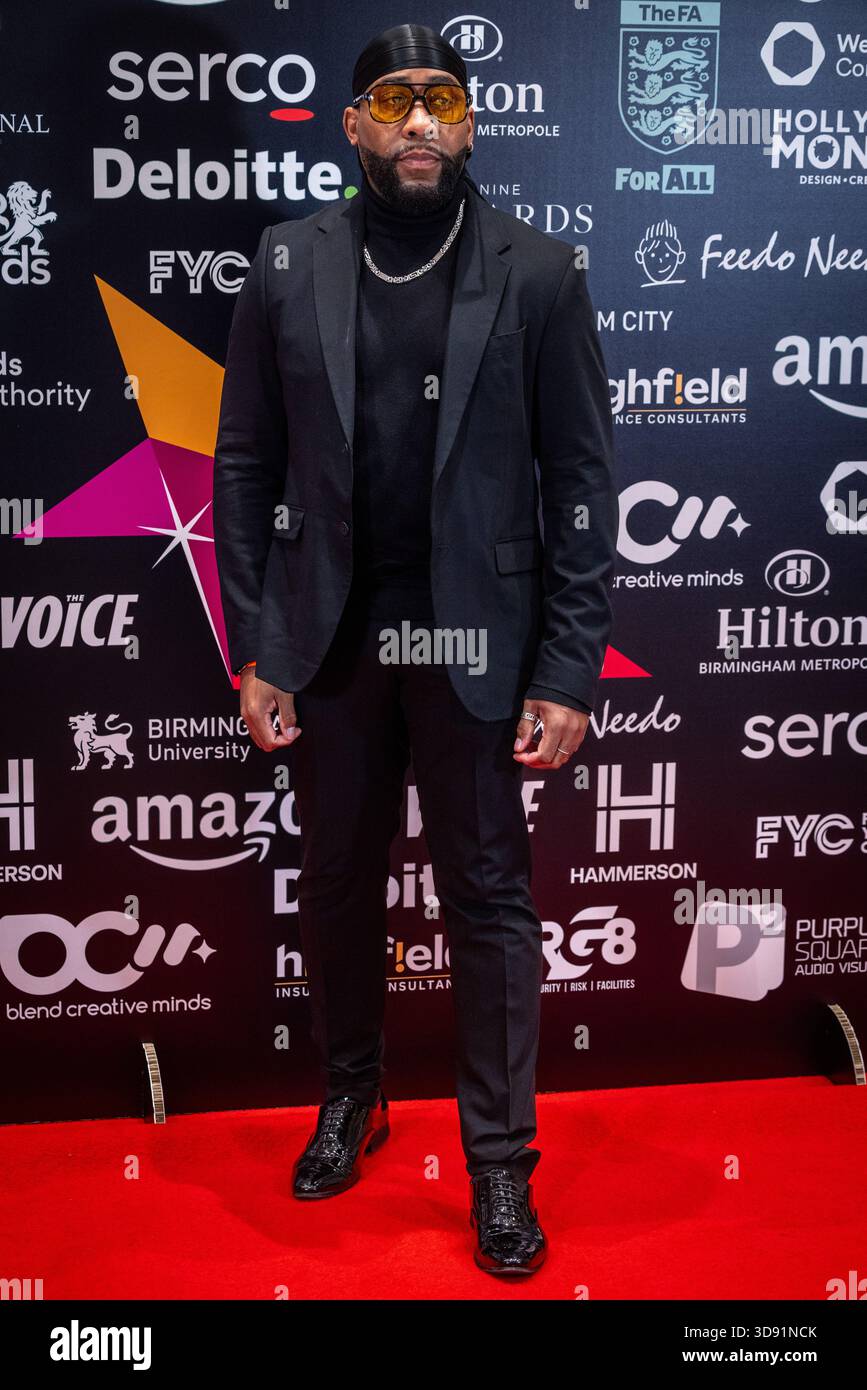 Kule T, membro del gruppo R&B MN8 degli anni '1990, partecipa ai MBCC Awards all'Hilton Birmingham Metropole, Birmingham, Regno Unito. Foto Stock