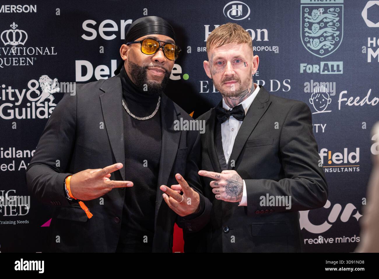 Kule T e Carl Scott partecipano agli MBCC Awards 2025 all'Hilton Birmingham Metropole, Regno Unito. Foto Stock