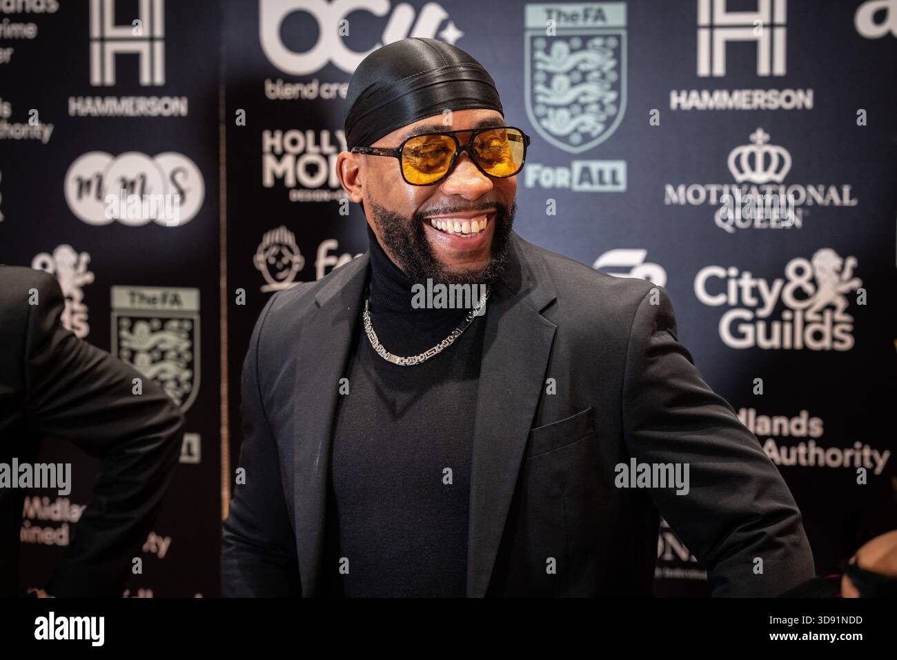 Kule T, membro del gruppo R&B MN8 degli anni '1990, partecipa ai MBCC Awards all'Hilton Birmingham Metropole, Birmingham, Regno Unito. Foto Stock