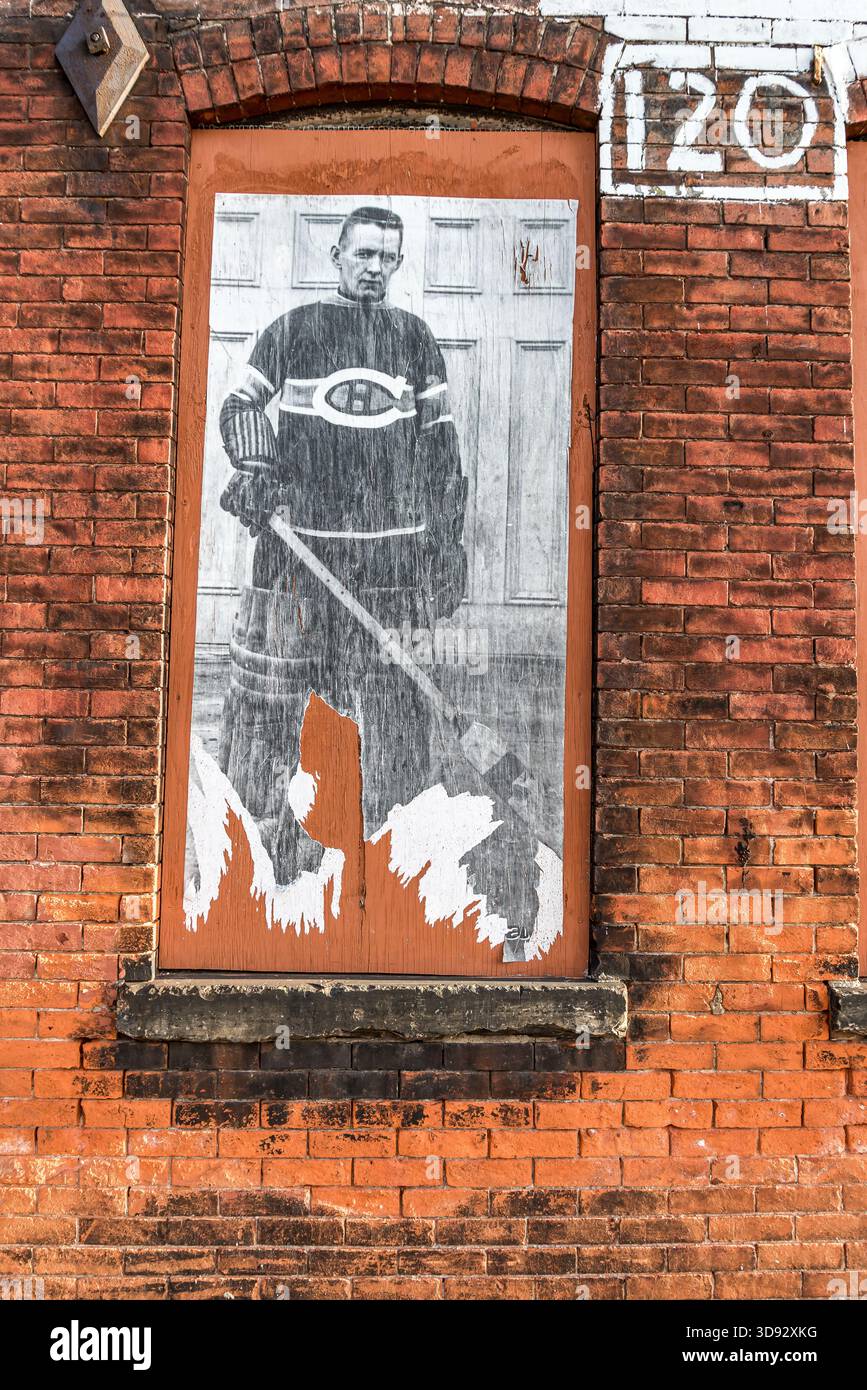 Il tempo ha battuto il poster di un portiere di hockey molto tempo fa Foto Stock