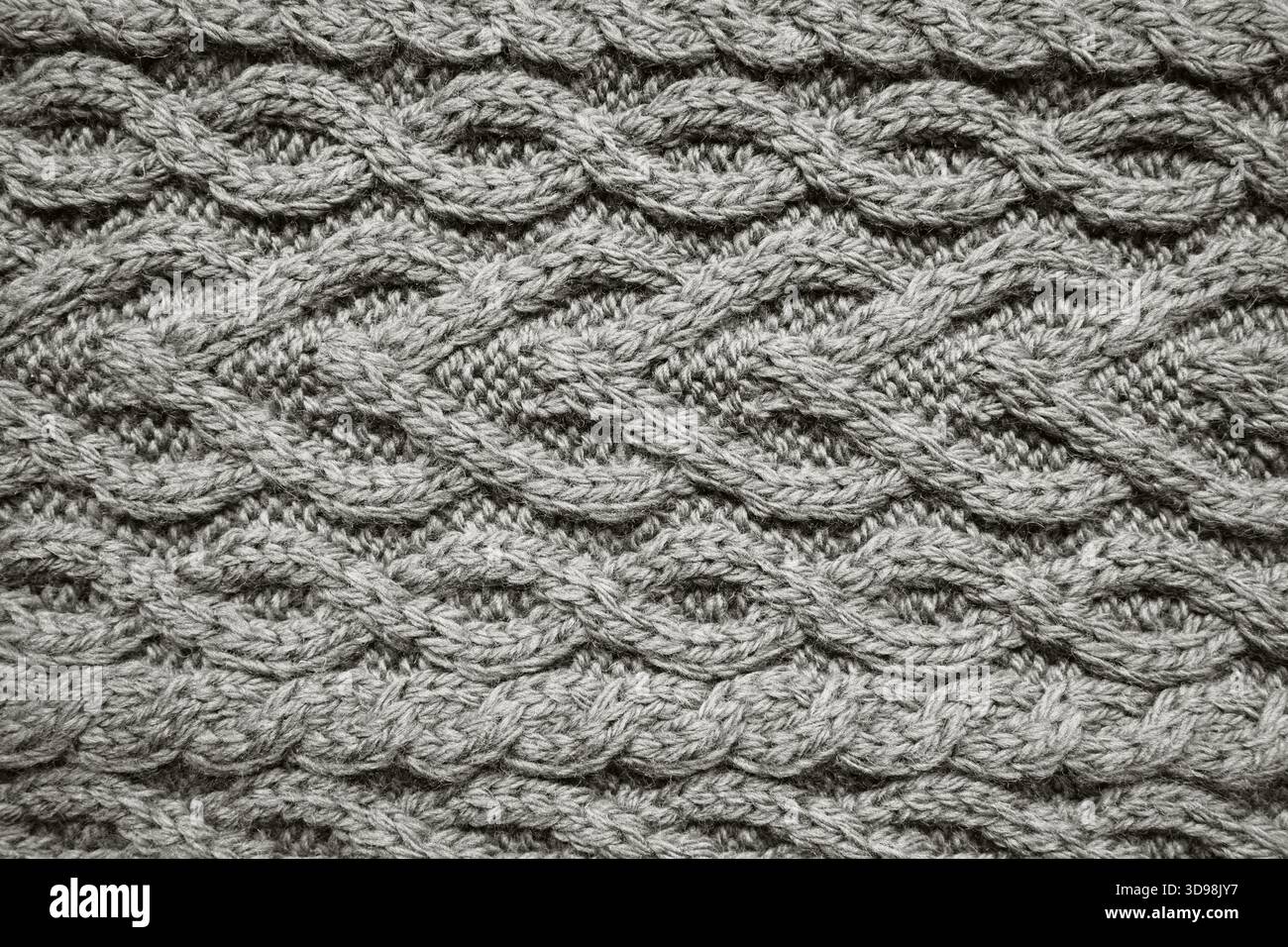 motivo a maglia a cavo. Accogliente sfondo nordico. Texture di lana ornata di 2026 anni di bianco nuvola Foto Stock