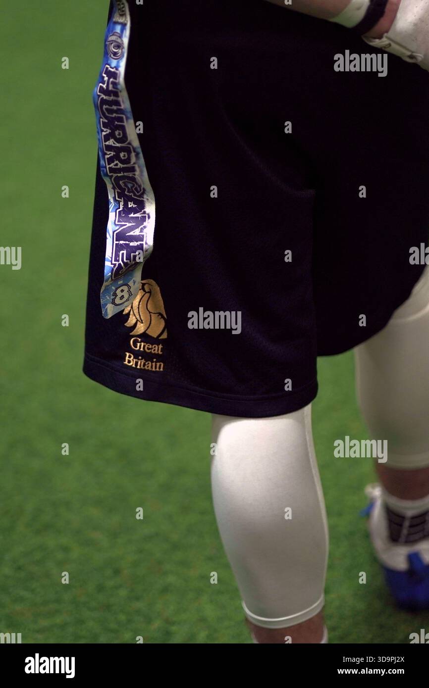 Giocatore di flag football che indossa pantaloncini inglesi. Foto Stock