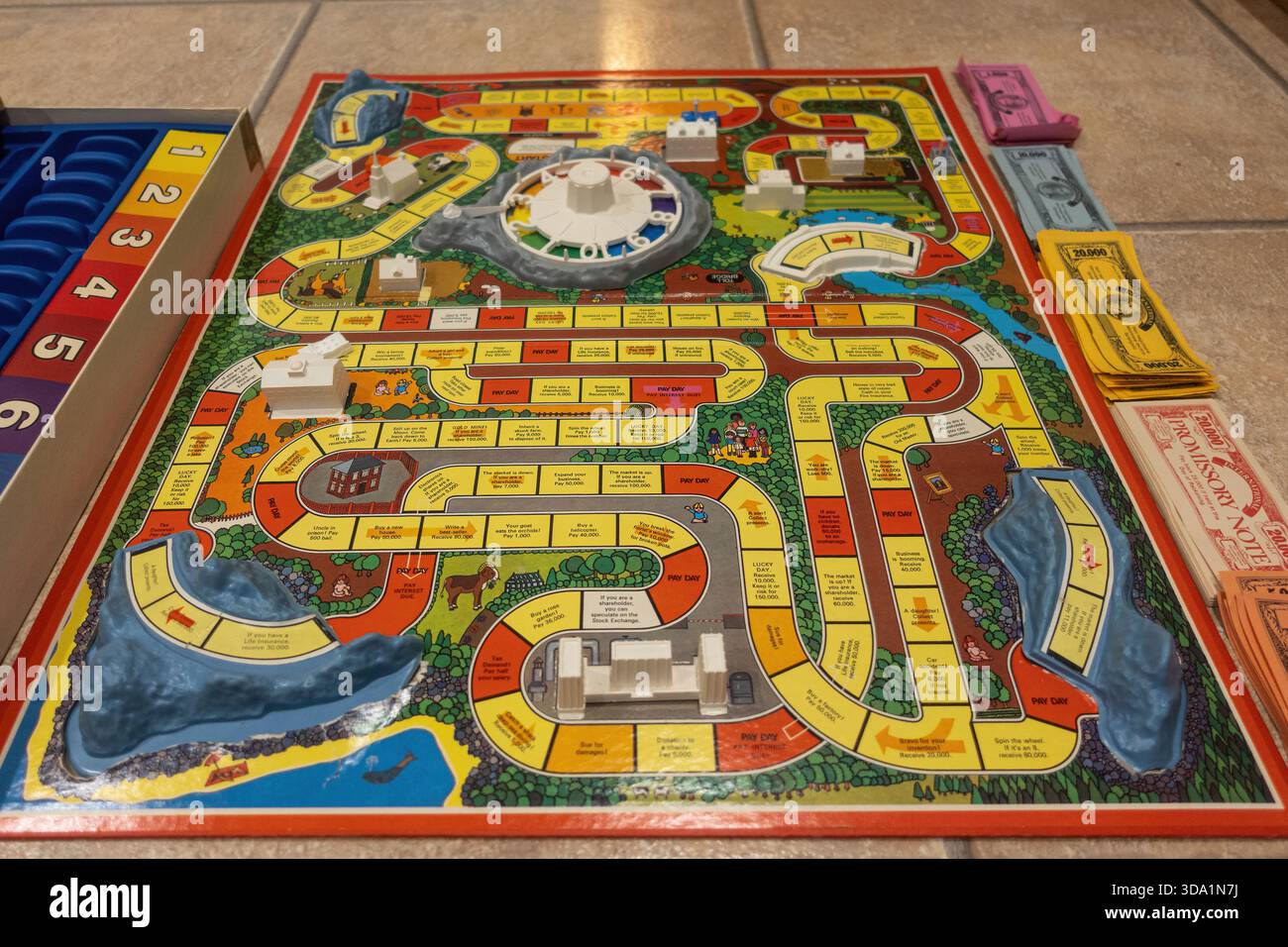 Game of Life, un classico gioco da tavolo Milton Bradley/Hasbro che simula l'età adulta Foto Stock