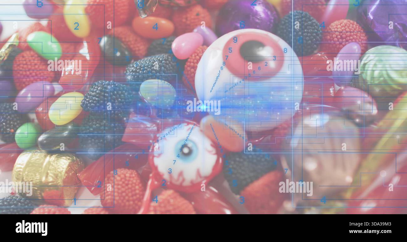 Mostrando due novità di caramelle per gli occhi sedute sul piano portapaziente, con gomme, lamina d'oro, mascherina a griglia Foto Stock