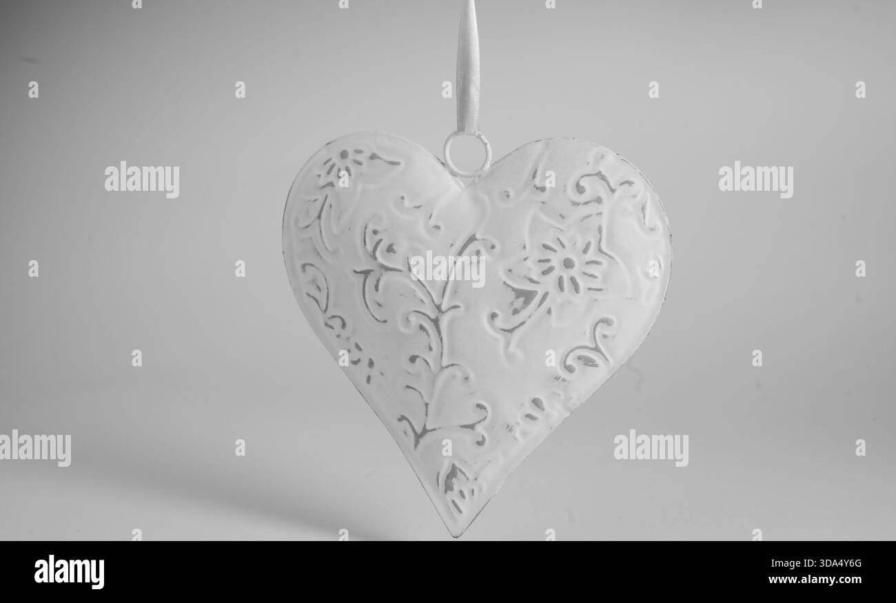 Ornamento a cuore bianco, immagine per San Valentino. Foto Stock