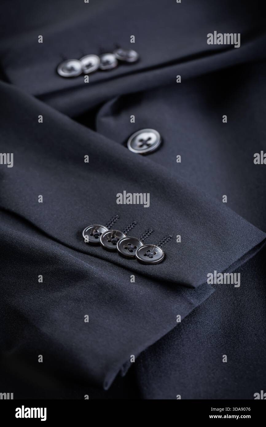 Dettaglio della giacca nera con bottoni - concetto di moda casual Foto Stock