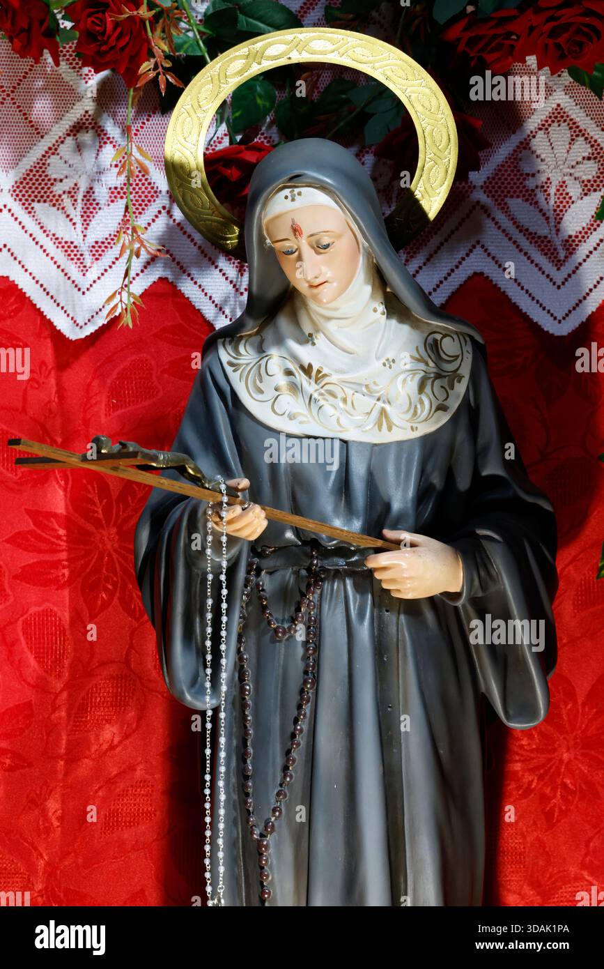 Basilica di Santa Maria in Montesanto. Santa Rita da Cascia è patrona delle vittime di abusi, delle coppie e delle difficoltà matrimoniali, delle vedove e dei malati. Foto Stock