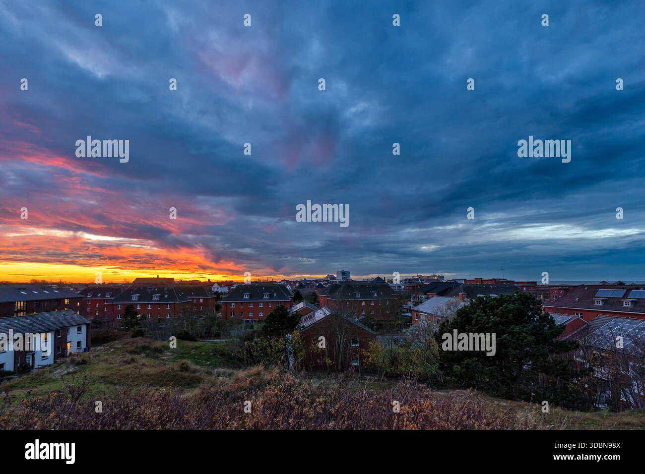 Tramonto sull'isola della Frisona orientale di Norderney, Germania Foto Stock