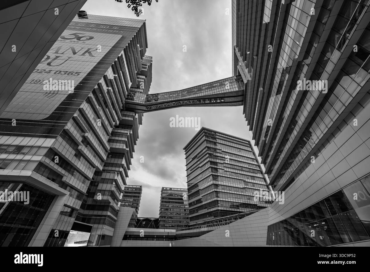 Nangang software Park, Taipei Taiwan, aprile 30 2025, Editorial Modern Office Towers and Skybridge, Dramatic Monochrome Composition Foto Stock