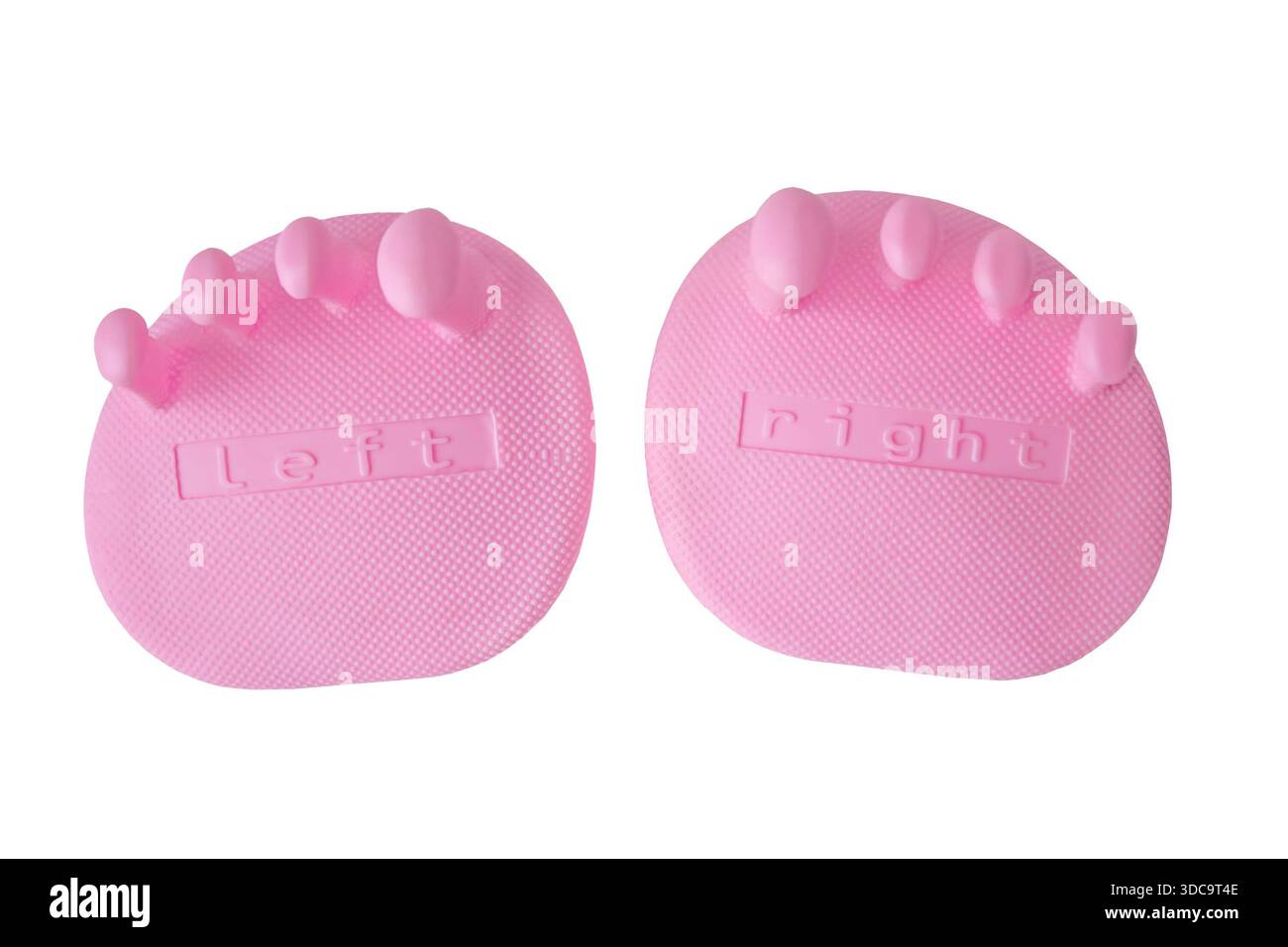 Una scarpa da ginnastica per allux valgus e flatfoot. Separatore di puntali in silicone rosa Foto Stock