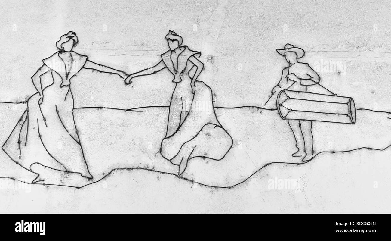 Disegno del profilo, di due ballerini accompagnati da un batterista, su un muro nella stazione ferroviaria di Arles, Francia. Foto Stock