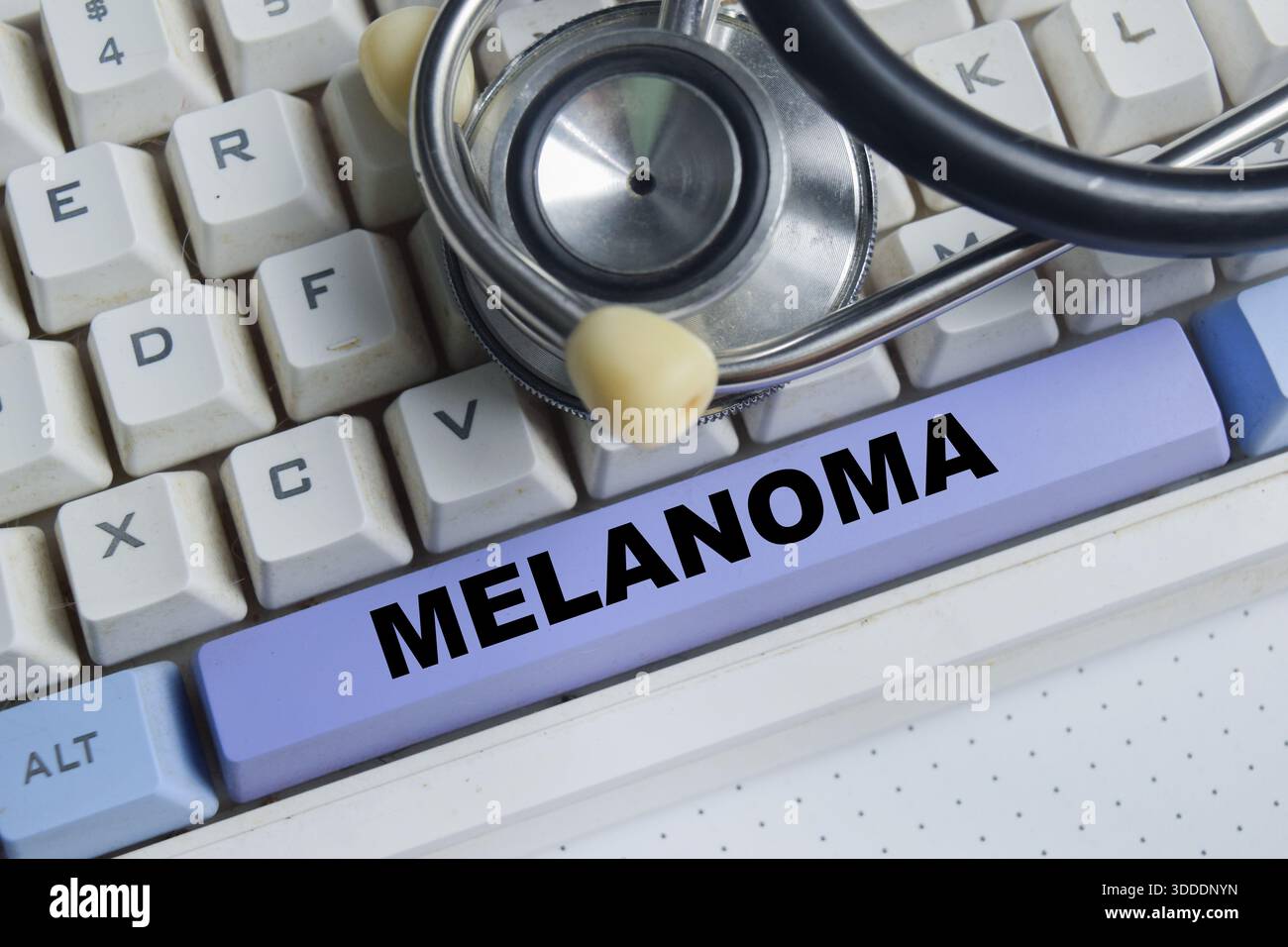 Pulsante melanoma sulla tastiera Foto Stock