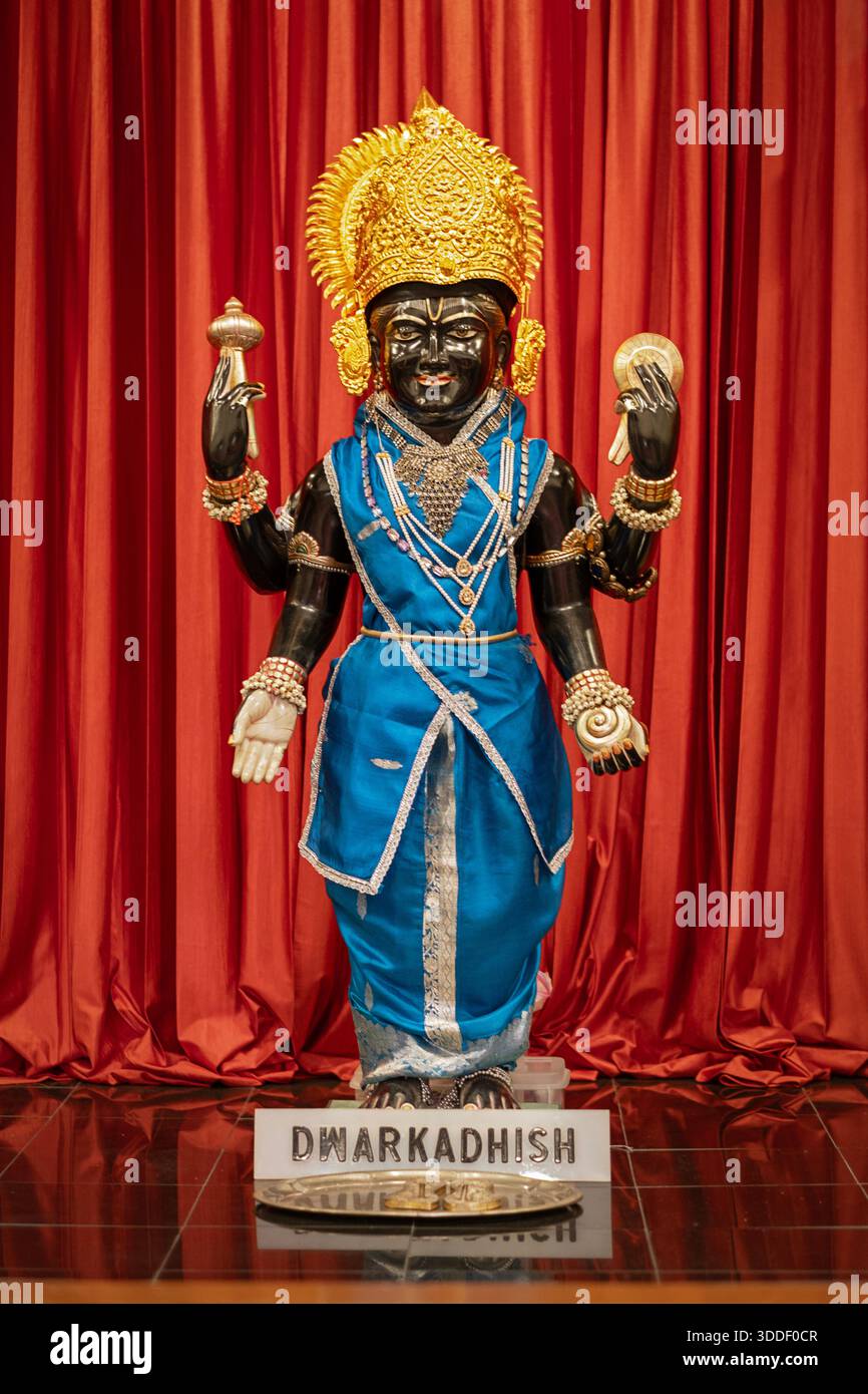 Una statua di Dwarkadhish che è un nome del dio Krishna. In un tempio indù a Woodside, Queens, New York. Foto Stock