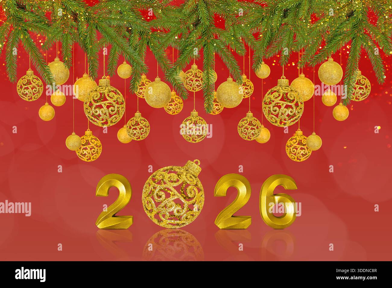 Composizione natalizia e Capodanno di elementi decorativi sotto forma di palle e il numero 2026 Foto Stock