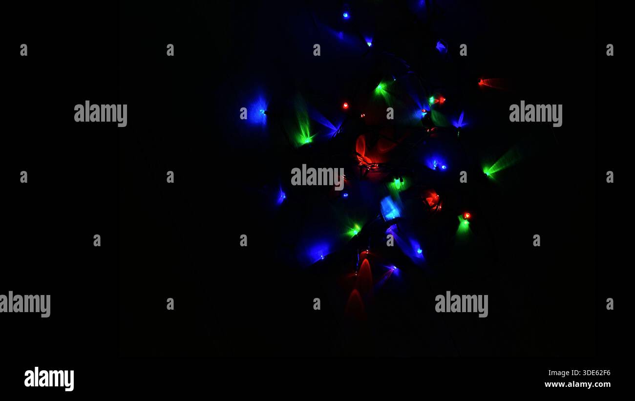 Luci LED colorate che illuminano le tenebre Foto Stock