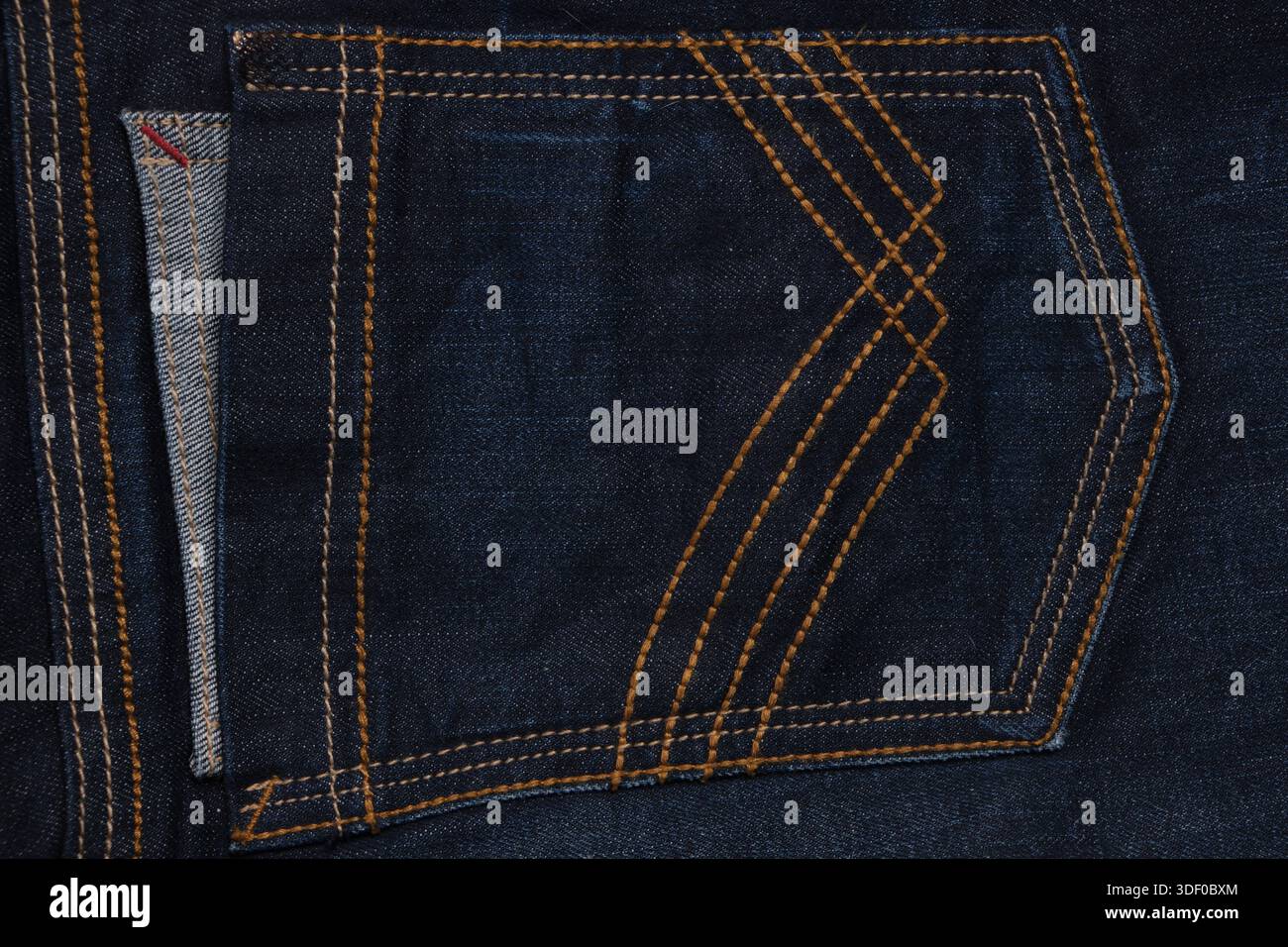 Tessuto jeans con cuciture. Primo piano Foto Stock