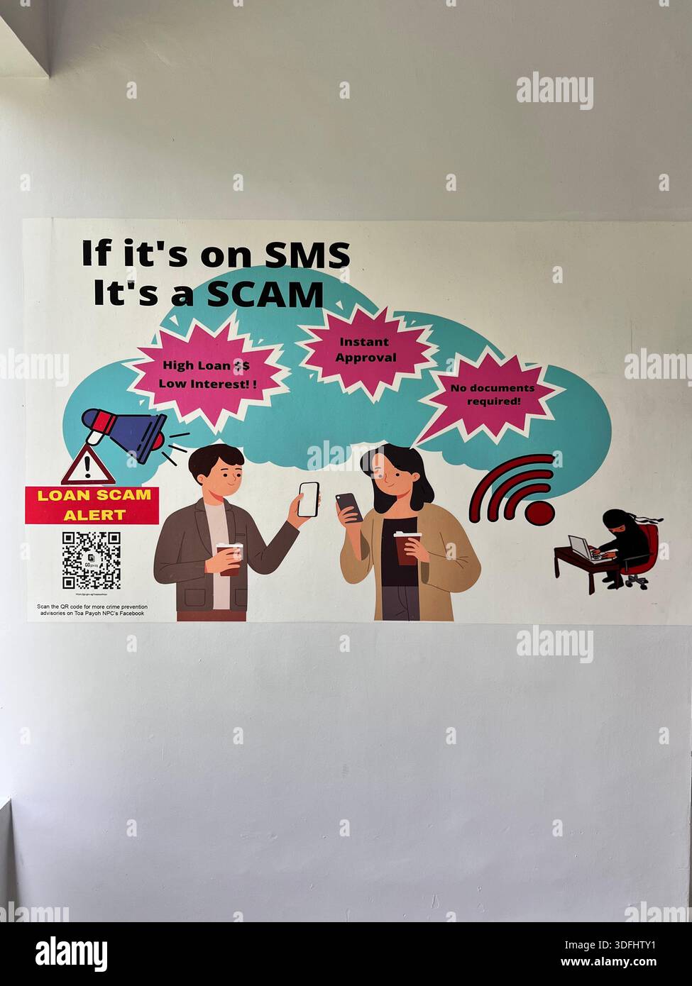 Poster a parete raffigurante la truffa dei prestiti sms sul telefono cellulare, promuovere la consapevolezza educativa per i membri del pubblico per fare attenzione al metodo di frode da parte di una persona malvagia. - Immagine stock catturata con smartphone