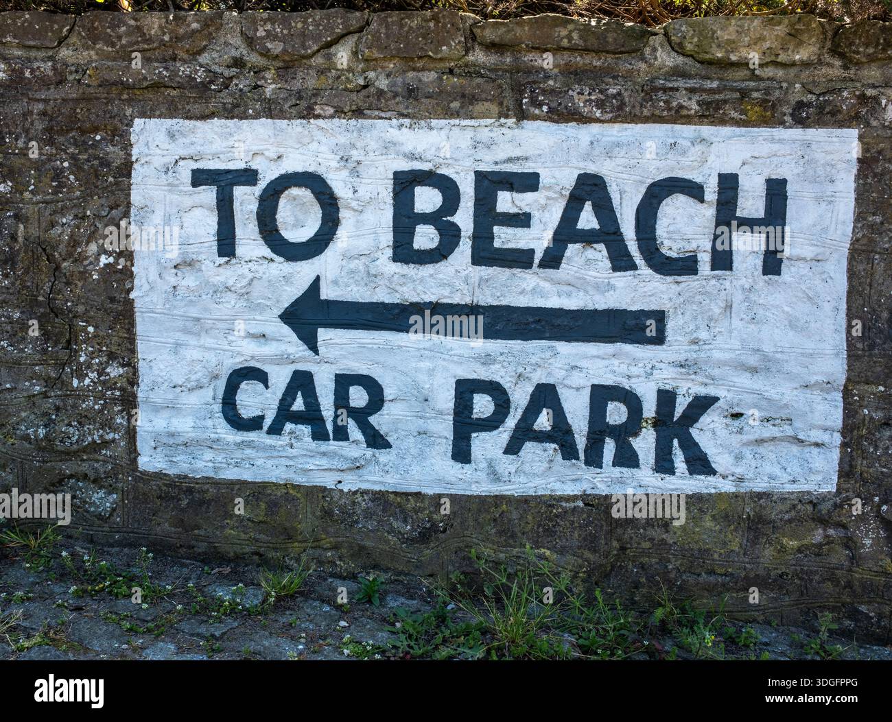 Per il parcheggio della spiaggia, segui le indicazioni per Pendine Sands Beach Carmarthenshire West Wales UK Foto Stock
