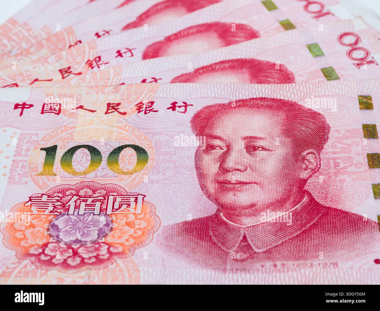 Primo piano del background di banconote cinesi da 100 yuan, che rappresenta la crescita dell'economia cinese, la forza monetaria, lo sviluppo finanziario, il commercio e la e globale Foto Stock