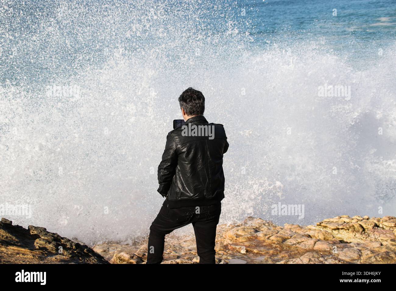 Selfie con l'onda Foto Stock
