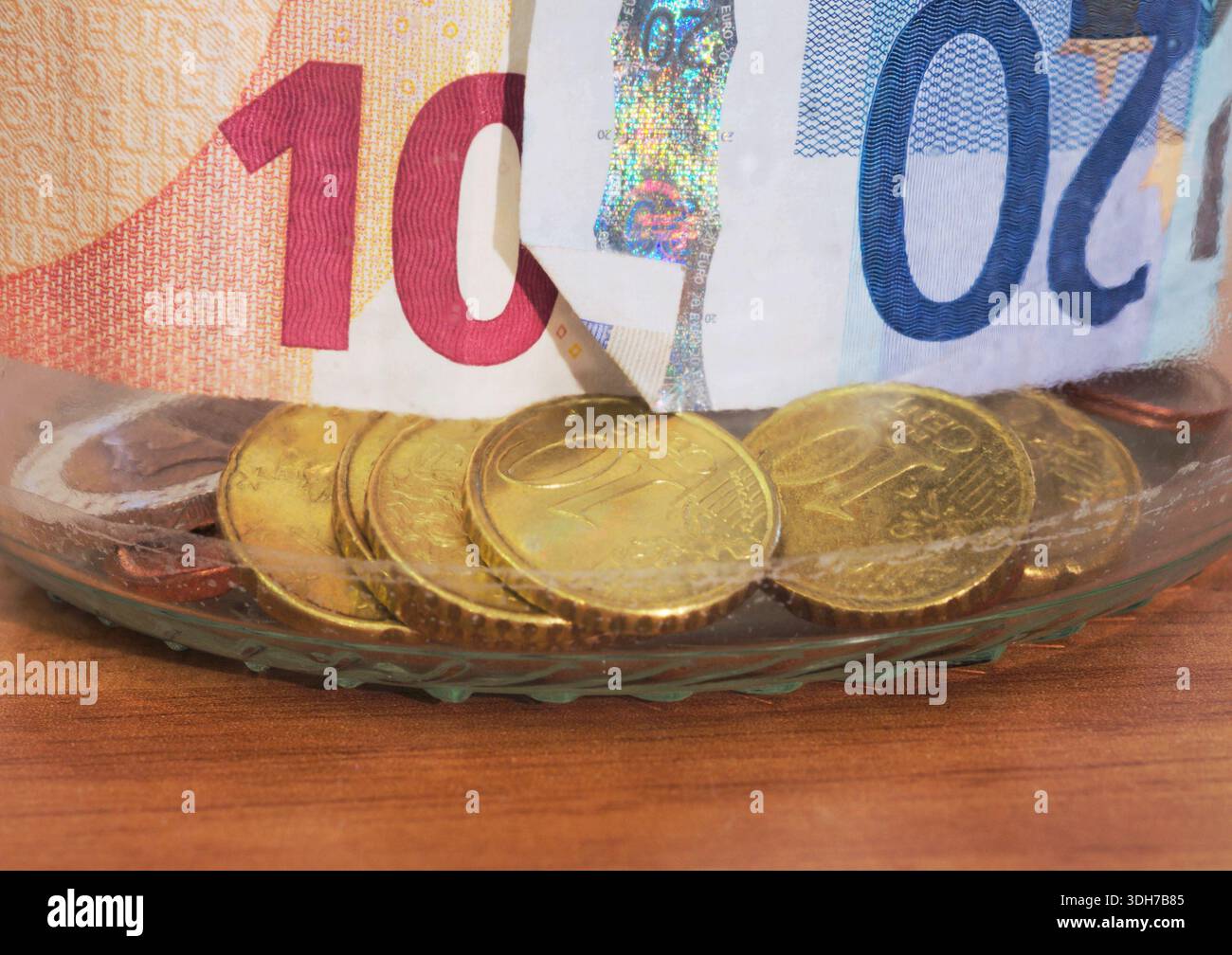 Un vasetto di vetro di Euro Foto Stock