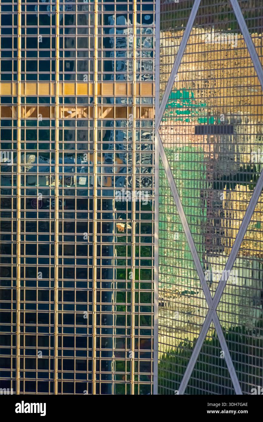 I raschietti del cielo di Hong Kong assumono una tonalità speciale, a seconda della luce e dei riflessi. Foto Stock
