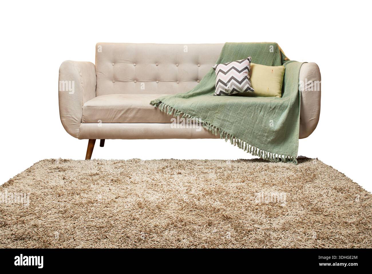 Una confortevole chaise longue con un intimo tappeto shag Foto Stock