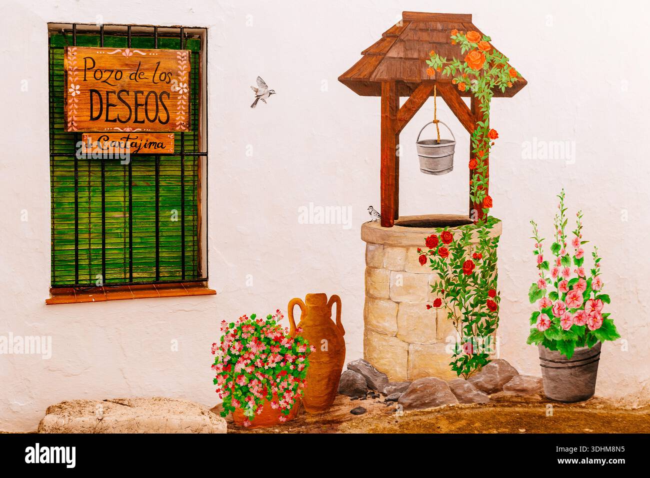 Murale "il pozzo dei desideri". Cartajima, Málaga, Andalucía, Spagna, Europa Foto Stock