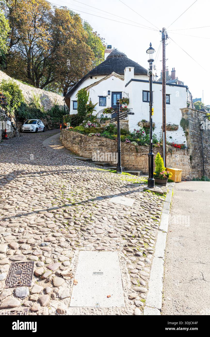 knaresborough, Yorkshire, Regno Unito, Inghilterra, ciottoli, strada acciottolata, strada, strada, ciottoli, collina, pavimentazione, strada in pietra, ciottoli, strada acciottolata, Foto Stock