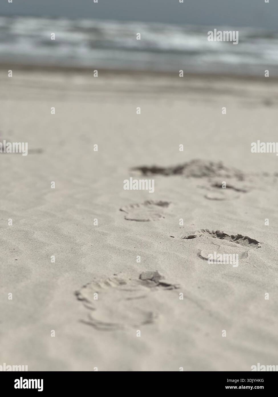 Stampe del piede nella sabbia Foto Stock