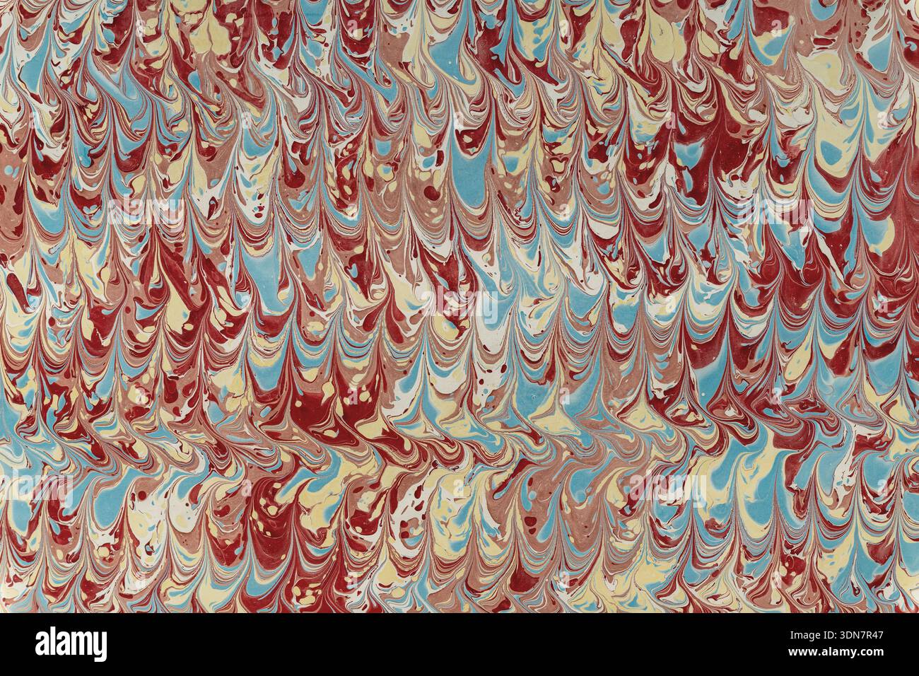Motivo in carta marmorizzata che mostra una consistenza fluida colorata e un design artistico astratto Foto Stock