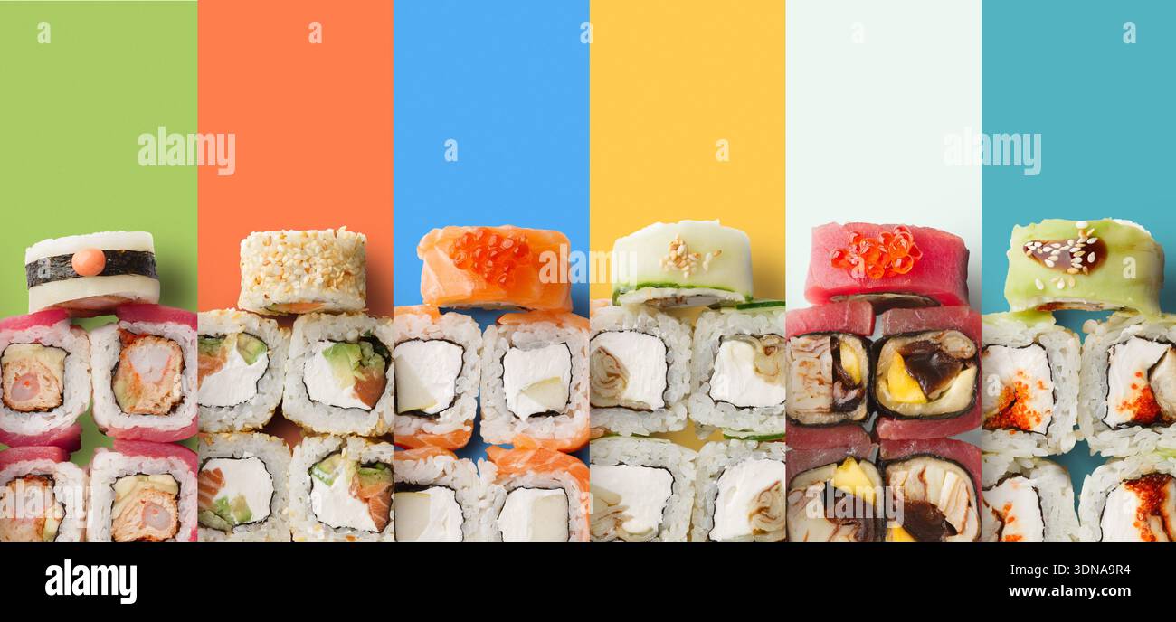 Sushi Rolls assortiti disposti su uno sfondo colorato con vari condimenti e ingredienti Foto Stock