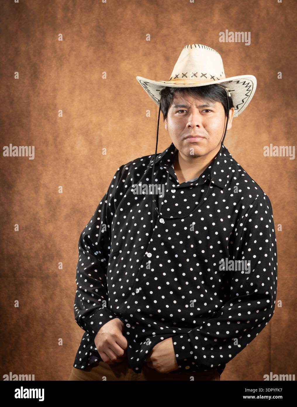 Cowboy in studio formale Foto Stock