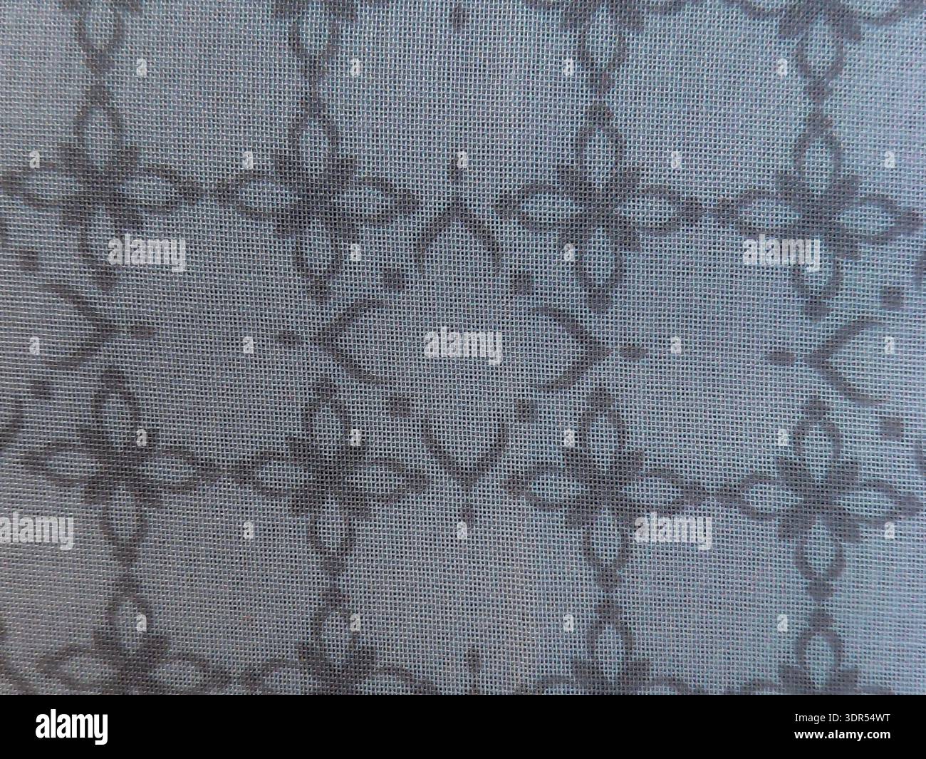 Elegante motivo in tessuto blu con design geometrico floreale intricato | Macro Fotografia di tessuti tessuti per l'interior design, Fashion Backgroun Foto Stock