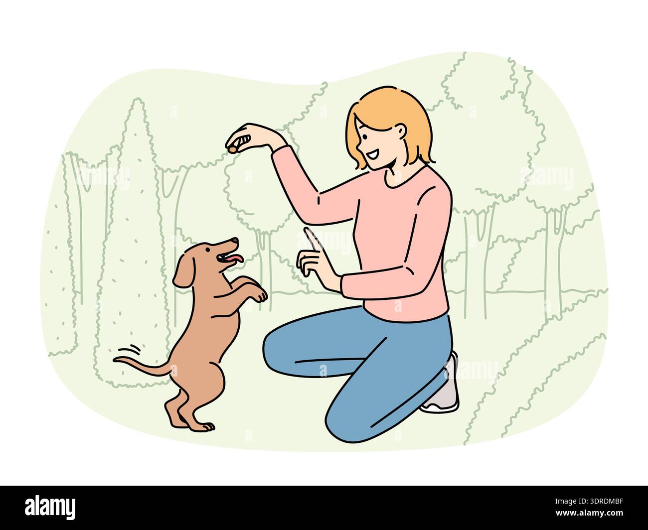 Ragazza sorridente che gioca con il cane nel parco Foto Stock