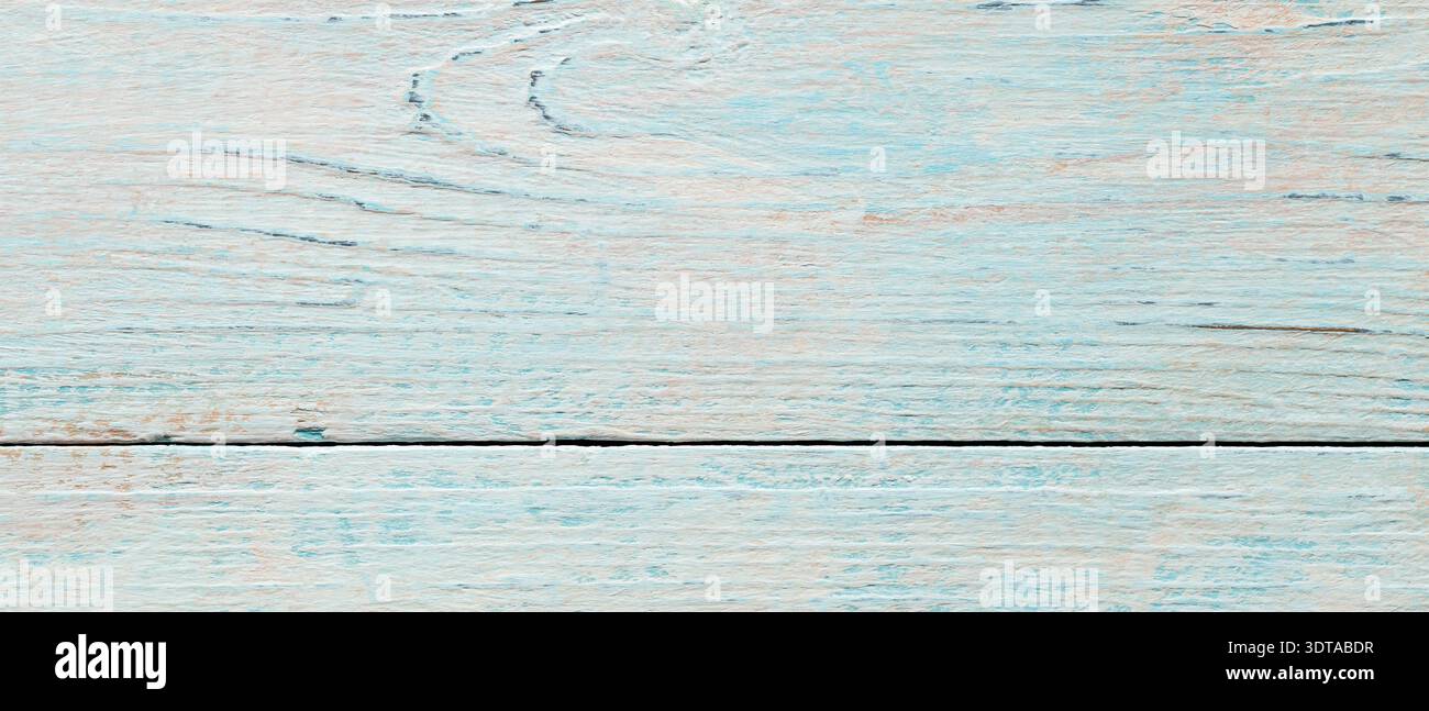 Tavole di legno temprate con vernice blu chiaro e pesca in formato orizzontale Foto Stock