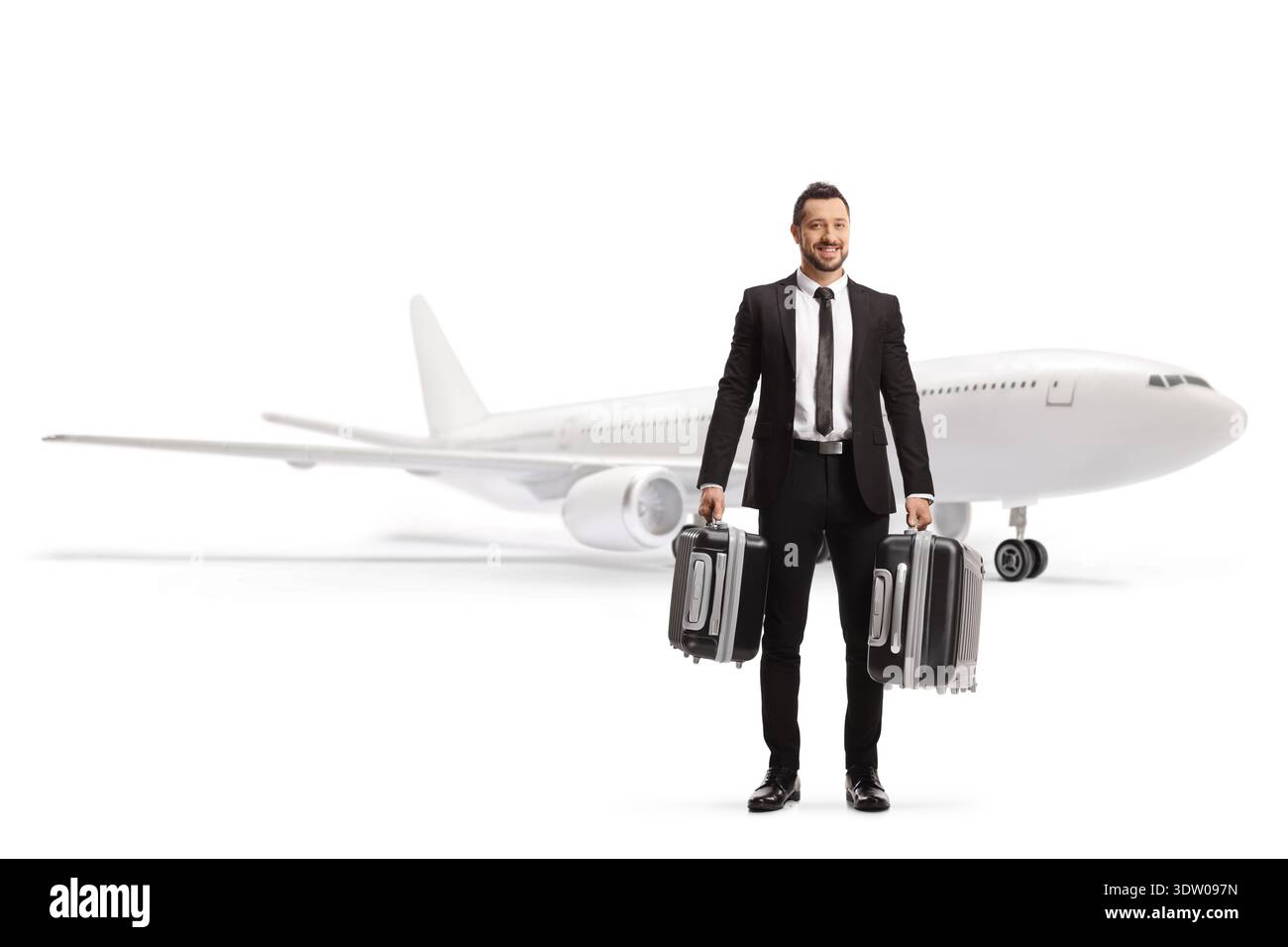 Uomo d'affari che trasporta valigie e viaggia in aereo isolato su sfondo bianco Foto Stock