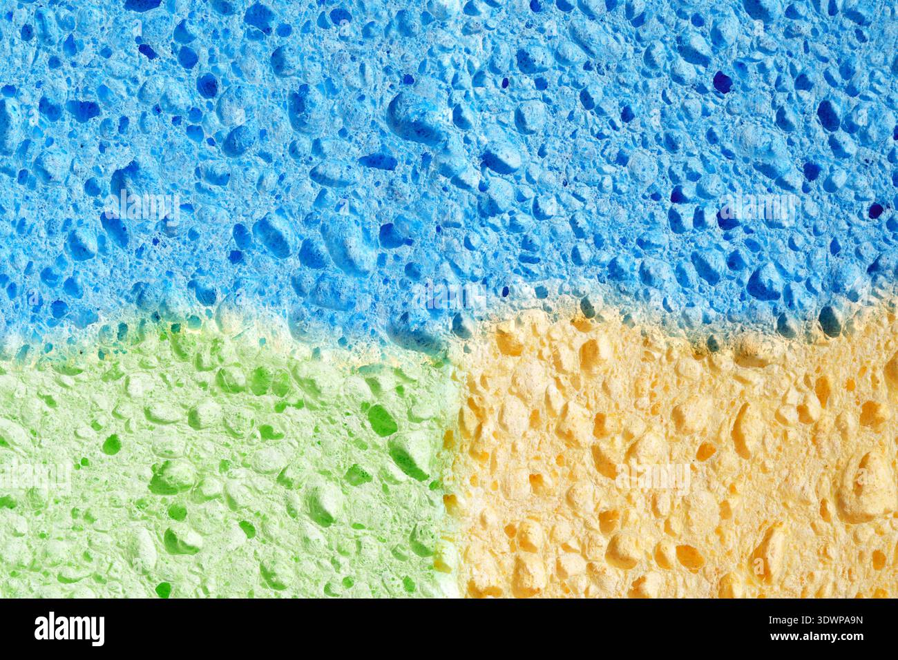 Mosaico giocoso di toppe in spugna con cuciture e texture diverse Foto Stock