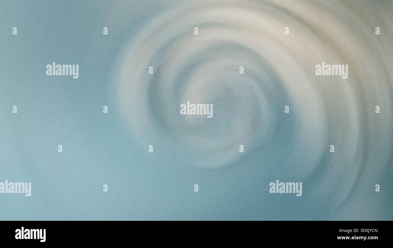 Una sfocatura astratta di colori tenui che crea un'atmosfera da sogno con delicati motivi vorticosi e luce Foto Stock