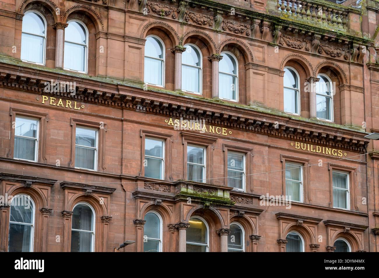 Insegna Pearl Assurance Buildings su una facciata dell'edificio, West George Street, Glasgow, Scozia, Regno Unito Foto Stock