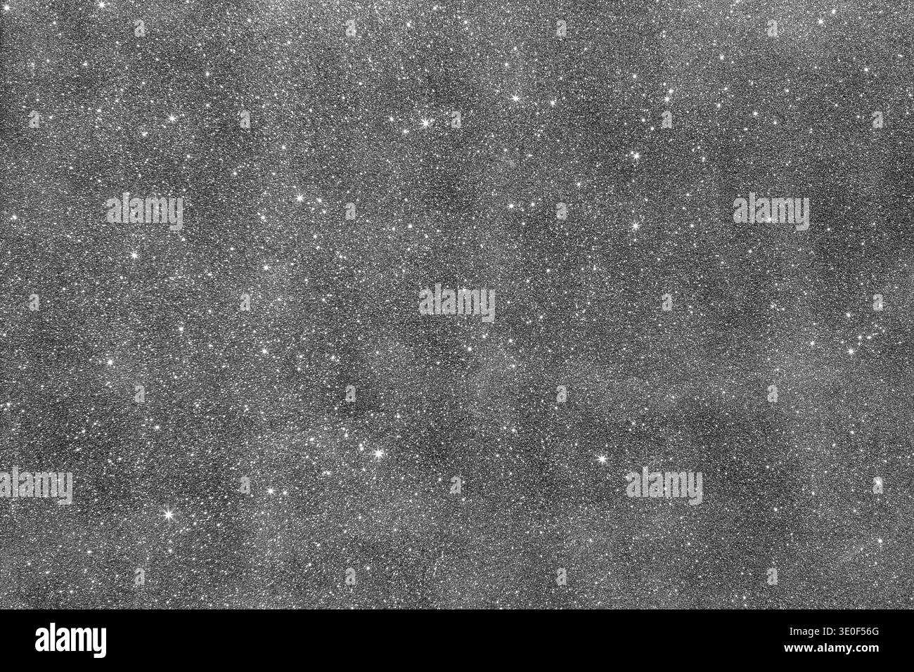 Campo stellare in scala di grigi ad alta risoluzione che mostra stelle dense lungo la via Lattea e la galassia lontana Foto Stock