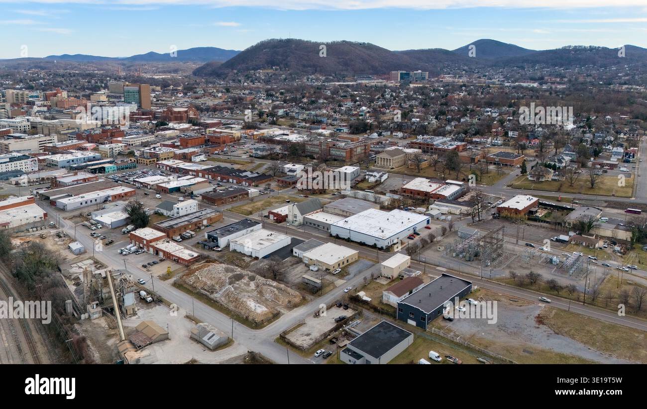 Aerial view of industrial district in Roanoke Virginia with hills Foto Stock