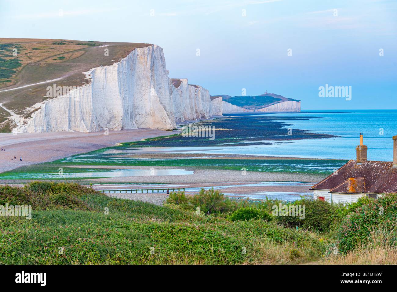 Vista al tramonto delle scogliere di sette sorelle in Inghilterra. IMMAGINE Foto Stock