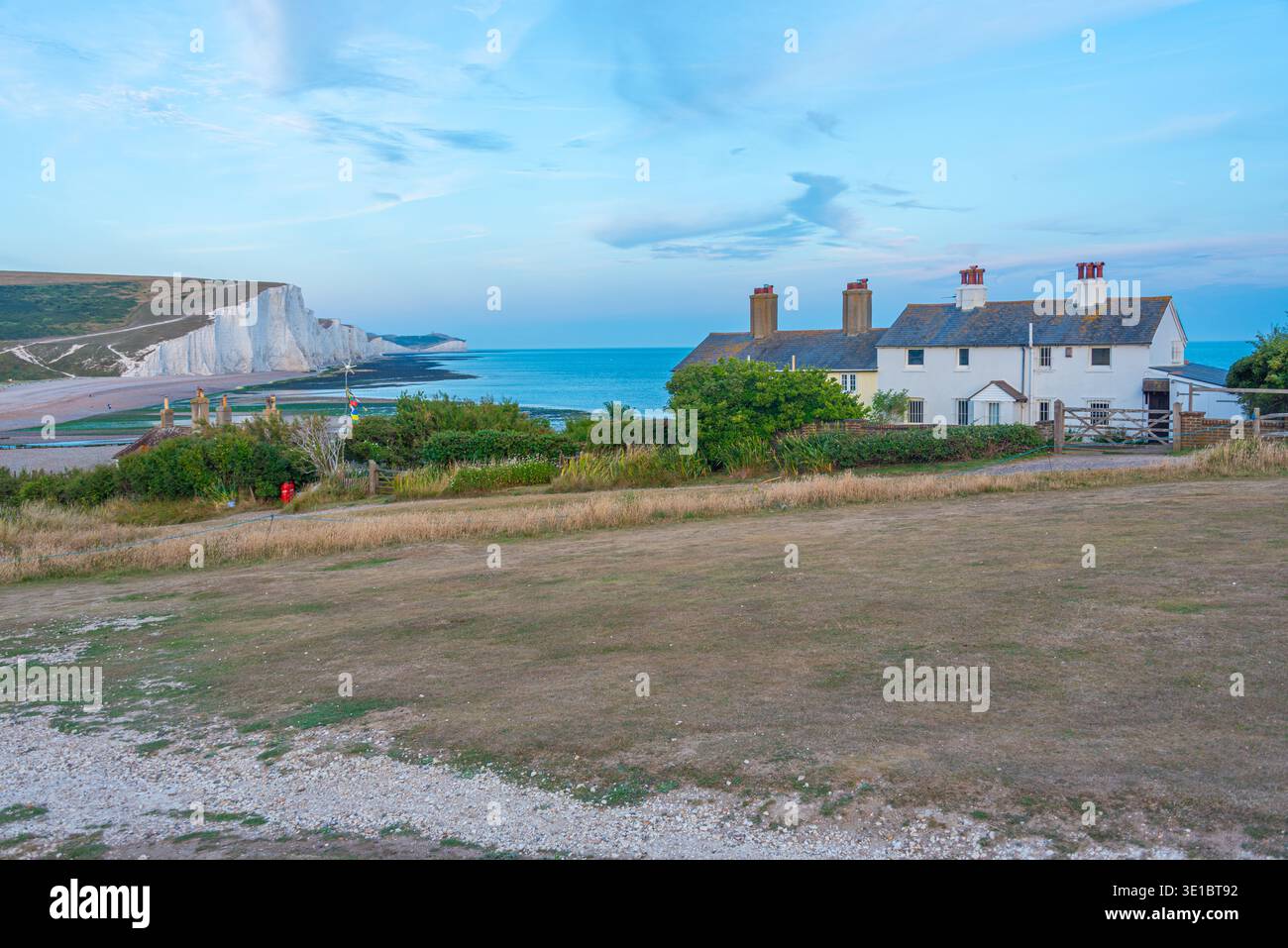 Vista al tramonto delle scogliere di sette sorelle in Inghilterra. IMMAGINE Foto Stock