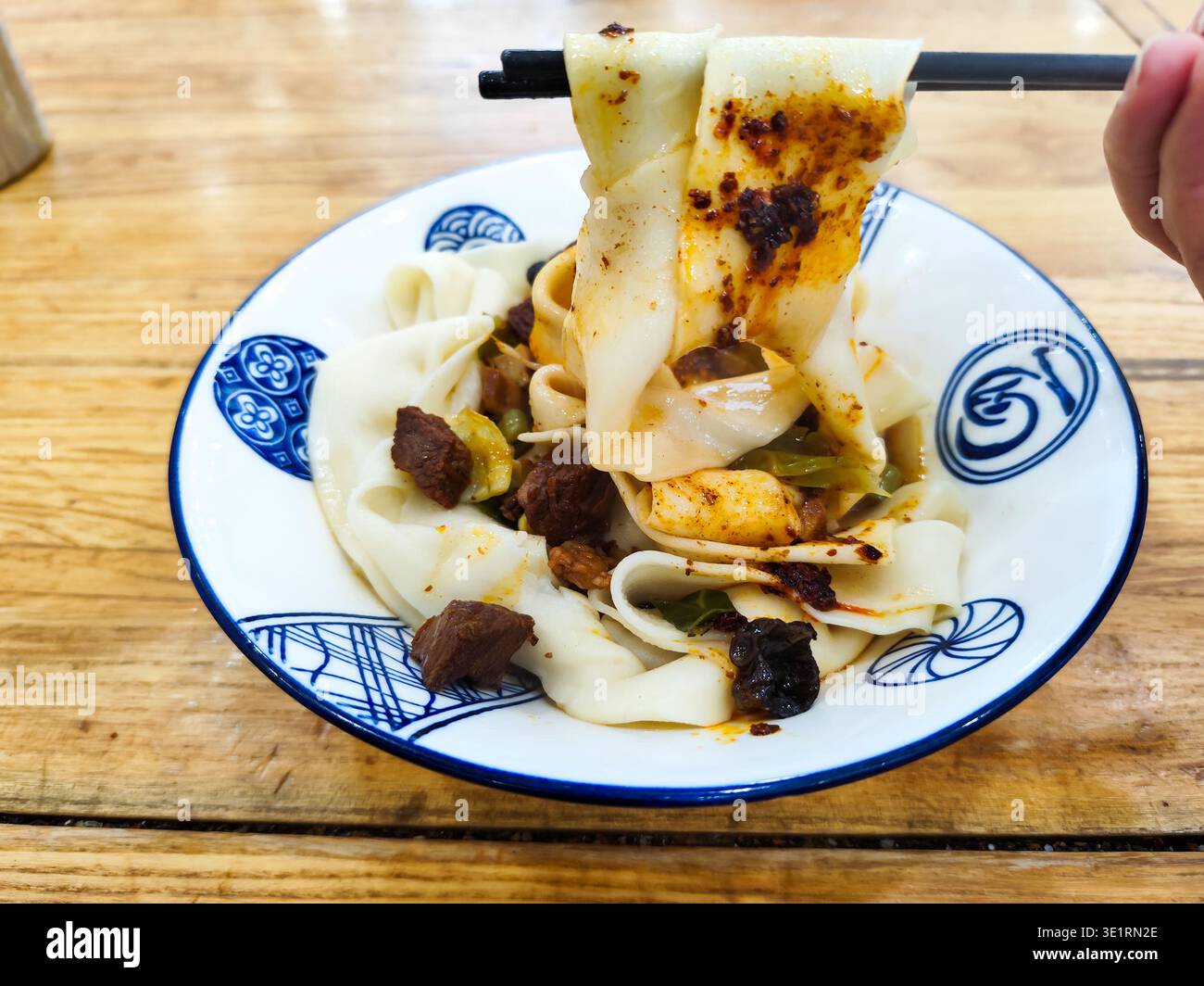 Tagliatelle Biangbiang a Xian, Shaanxi, Cina. Biang biang mian, cucina cinese Shaanxi servita a Xian Foto Stock