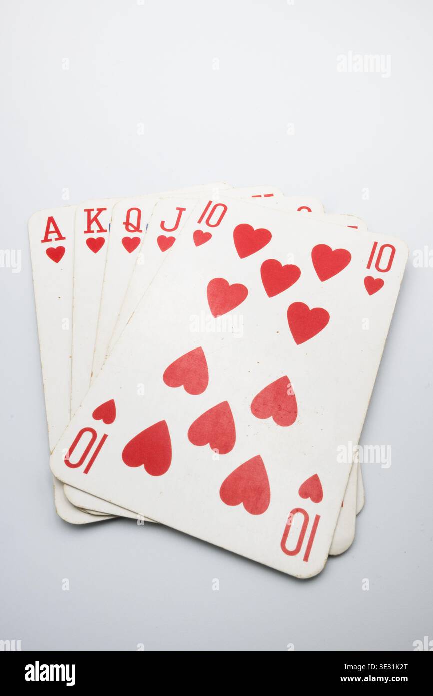 Giocare a carte, a poker, la mano più forte. Foto Stock